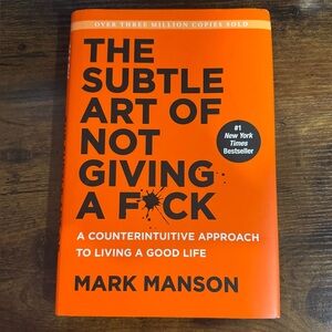 “The Subtle Art of Not Giving a F*ck*” by Mark Manson